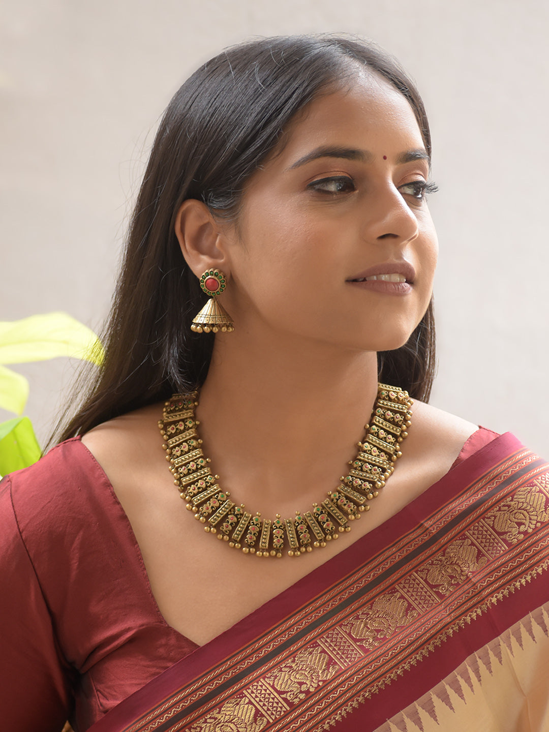 Chakrika - Handcrafted Antique Gold Step-Panel Terracotta Necklace Set with Red-Green Stone Detailing and Bold Earrings