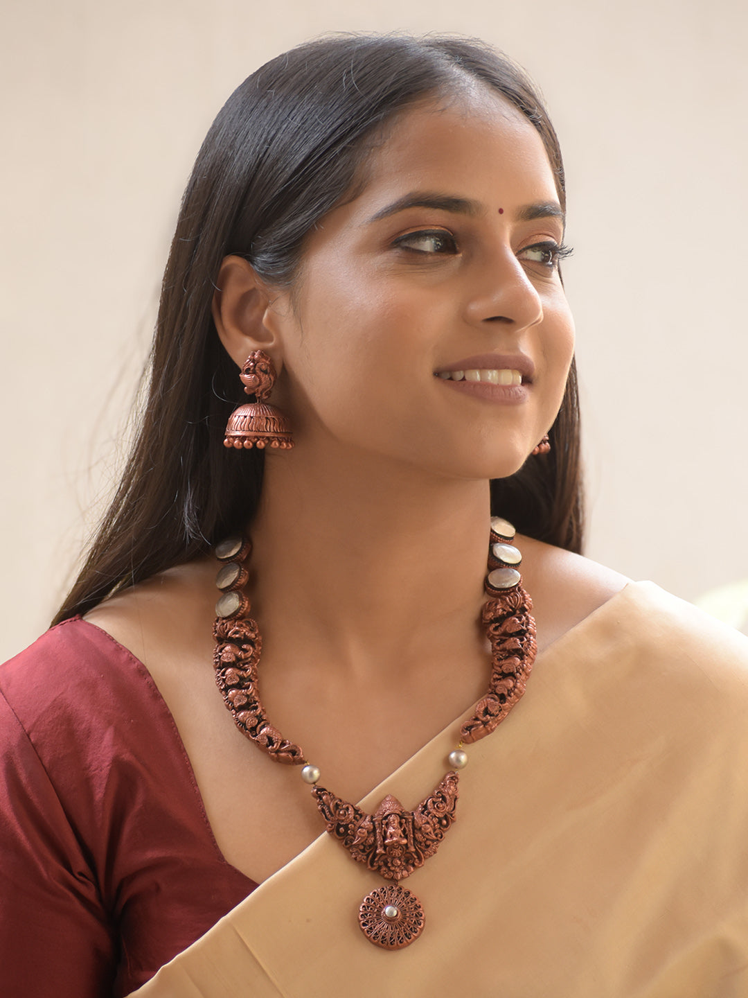 Tamralakshmi - Handcrafted Copper-Finish Terracotta Temple Necklace Set with Goddess Lakshmi & Peacock Motifs and Matching Earrings