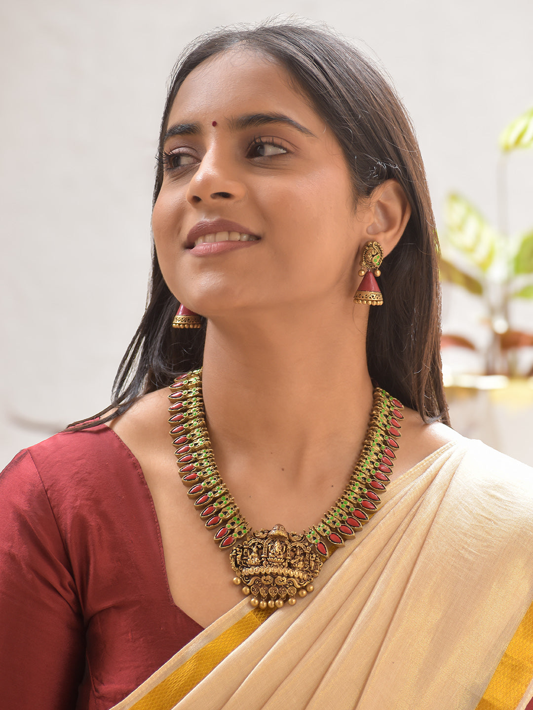 Terracotta Antique Ganesha Lakshmi Saraswati Temple Necklace Set with Ruby-Green Detailing