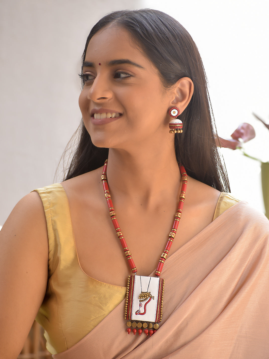 Terracotta Red Beaded Necklace with Hand-Painted Divine Foot Motif Pendant