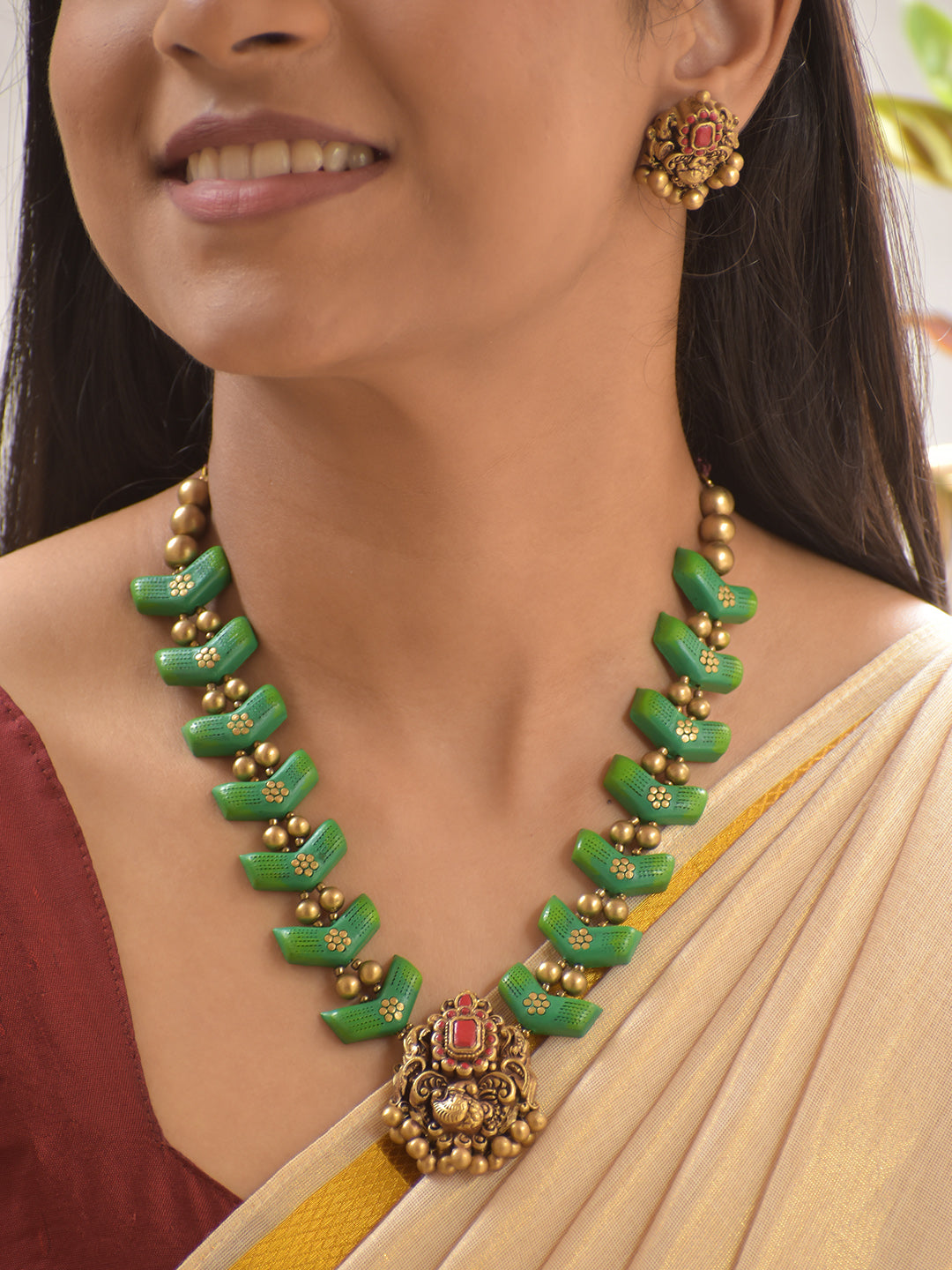 Terracotta Green Beaded Necklace Set with Antique Peacock Pendant