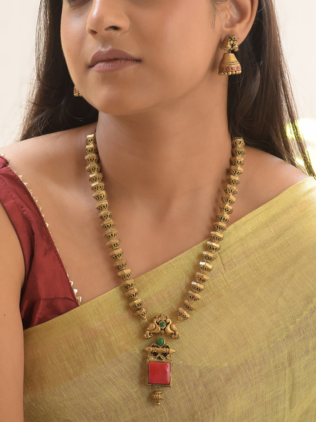 Peacoria - Handcrafted Antique Geometric Bead Terracotta Necklace Set with Red-Green Stone Pendant and Peacock Motif Earrings