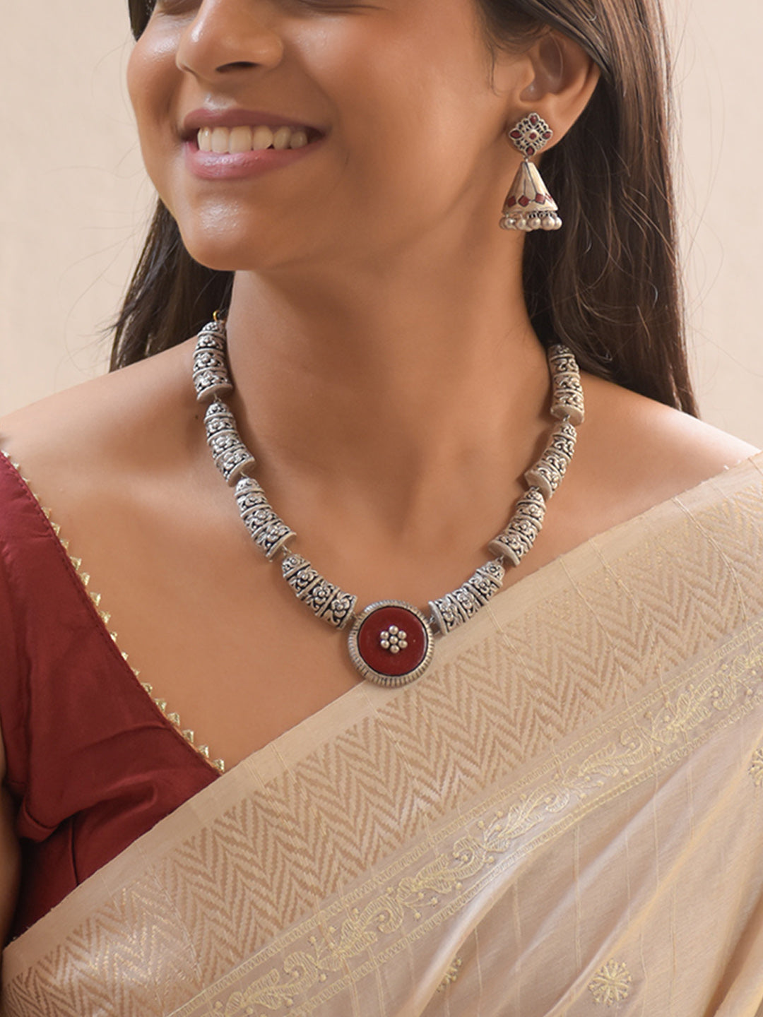 Suhasini - Handcrafted Antique Gold Terracotta Necklace Set with Brown Floral Centerpiece and Matching Earrings