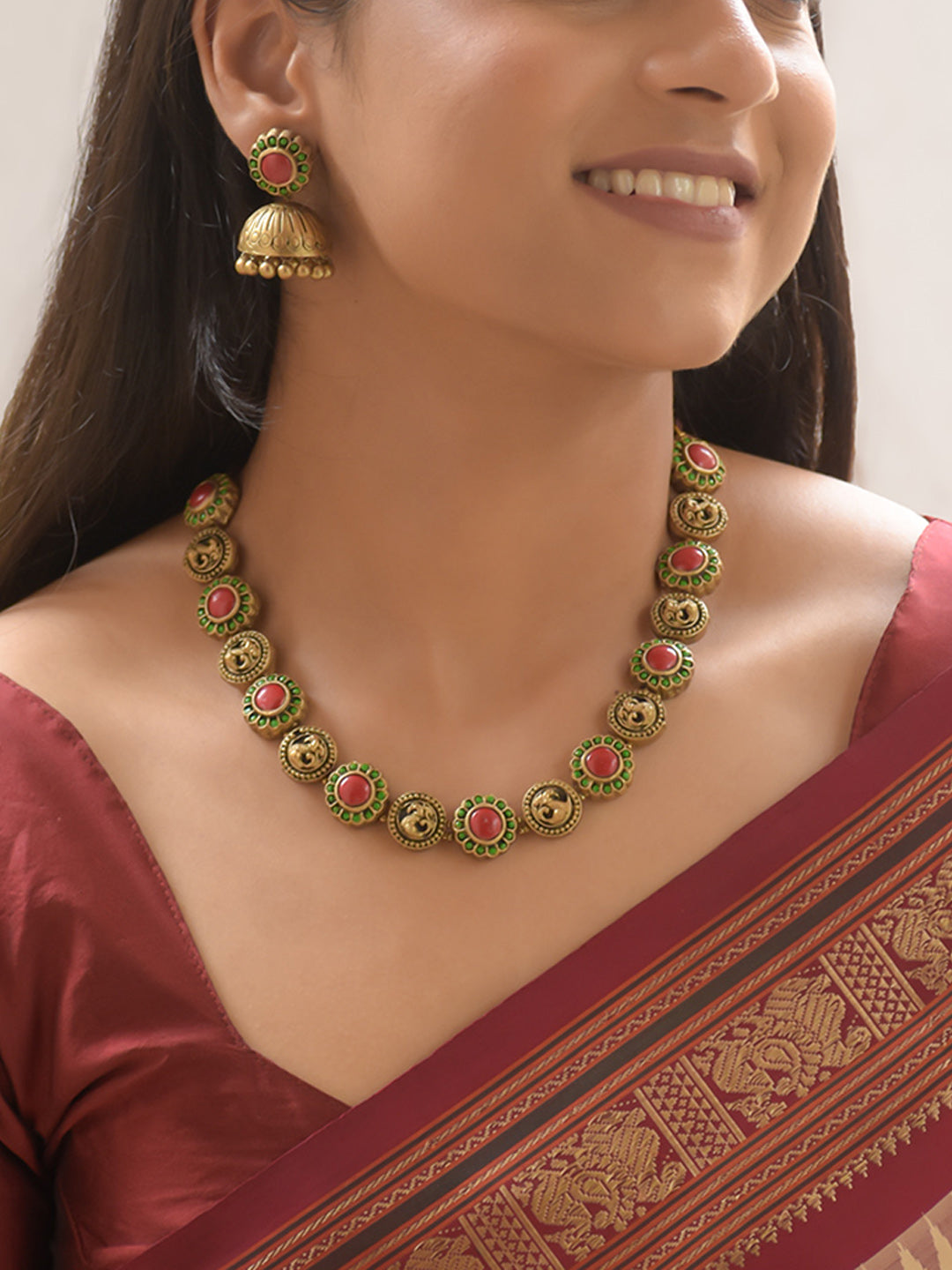 Mayurasundari - Handcrafted Antique Peacock Motif Terracotta Necklace Set with Red-Green Beaded Accents and Designer Earrings