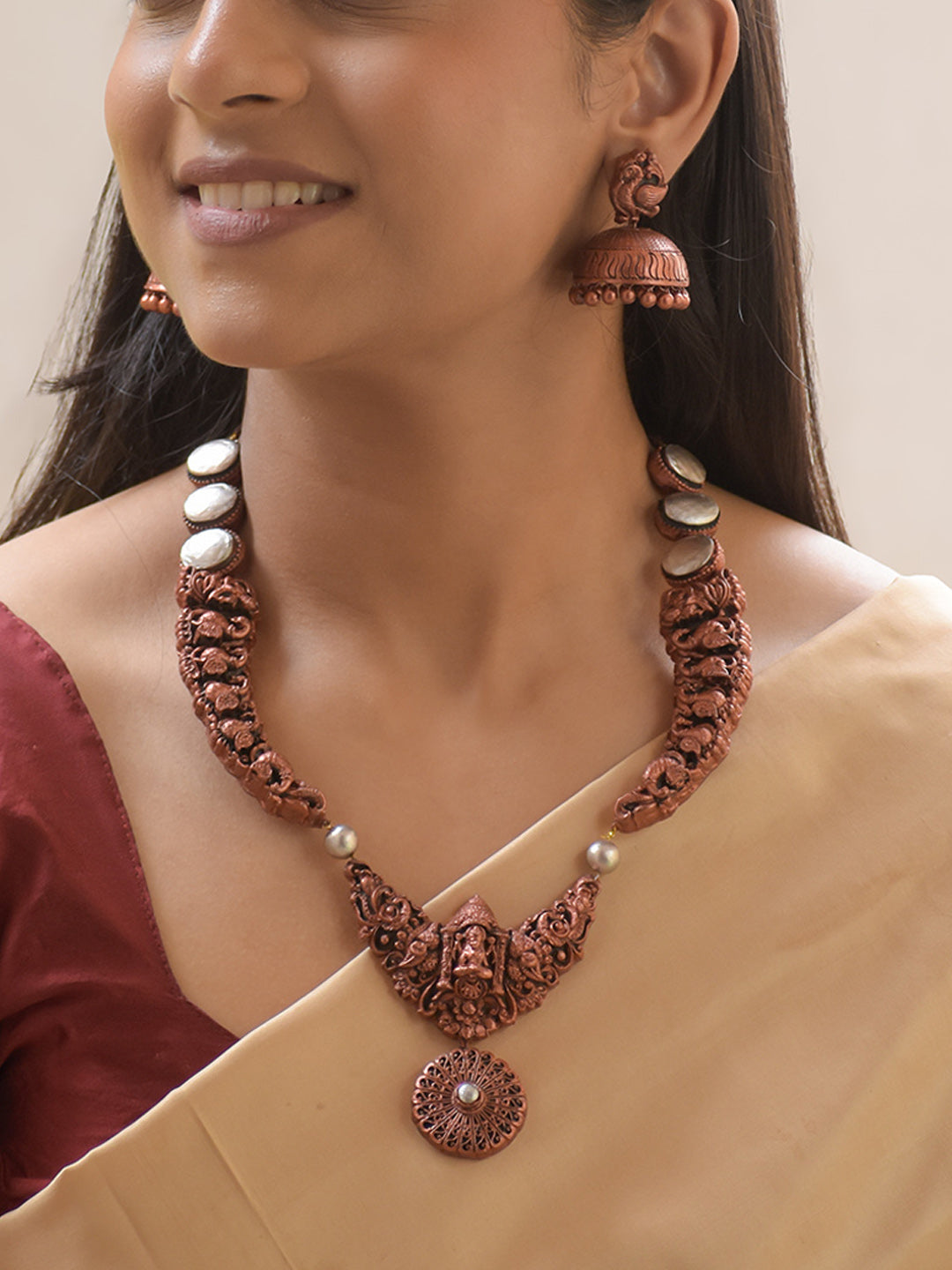 Tamralakshmi - Handcrafted Copper-Finish Terracotta Temple Necklace Set with Goddess Lakshmi & Peacock Motifs and Matching Earrings
