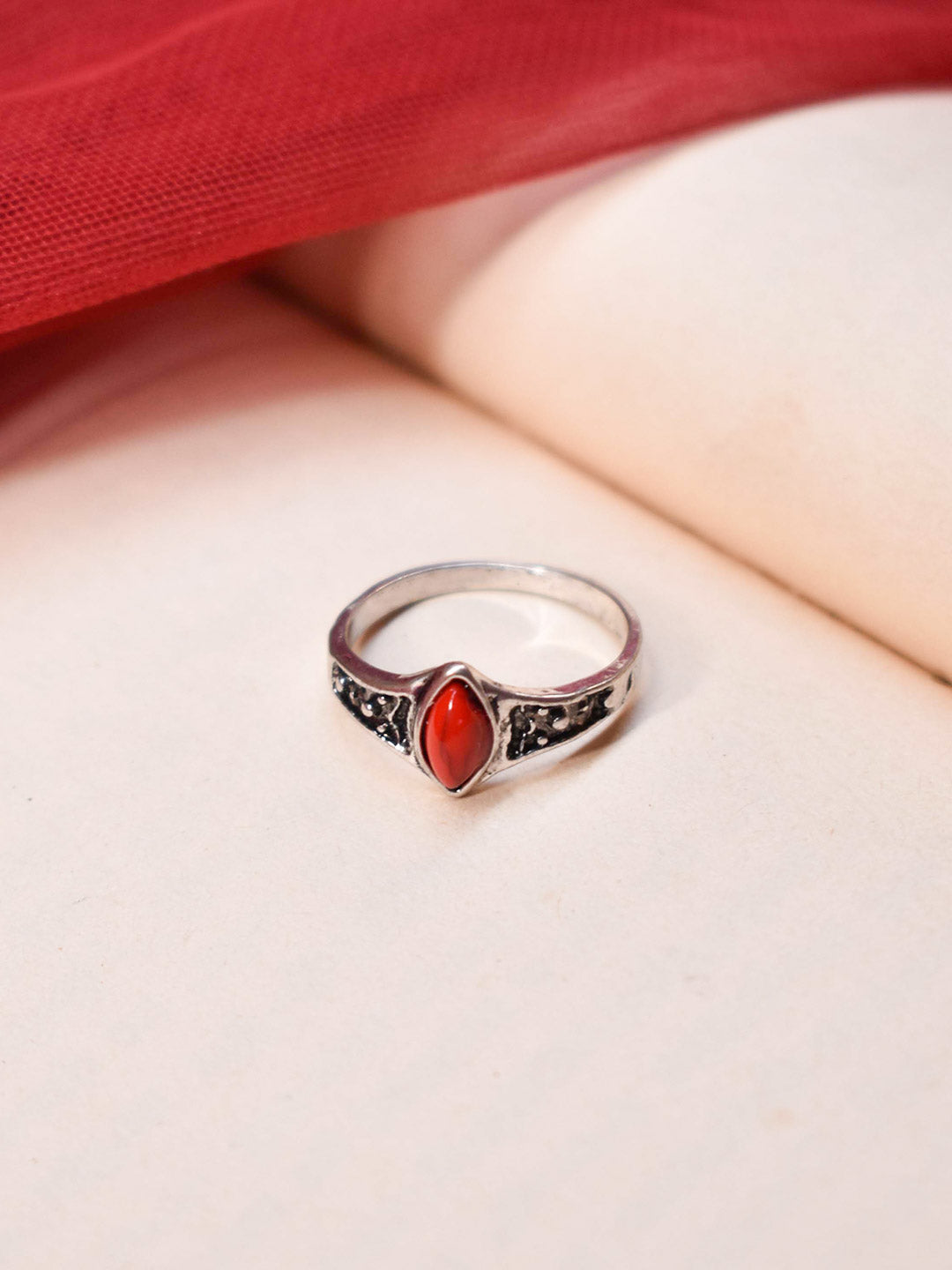 Aana Silver Plated Oval Design Red Color Finger Ring