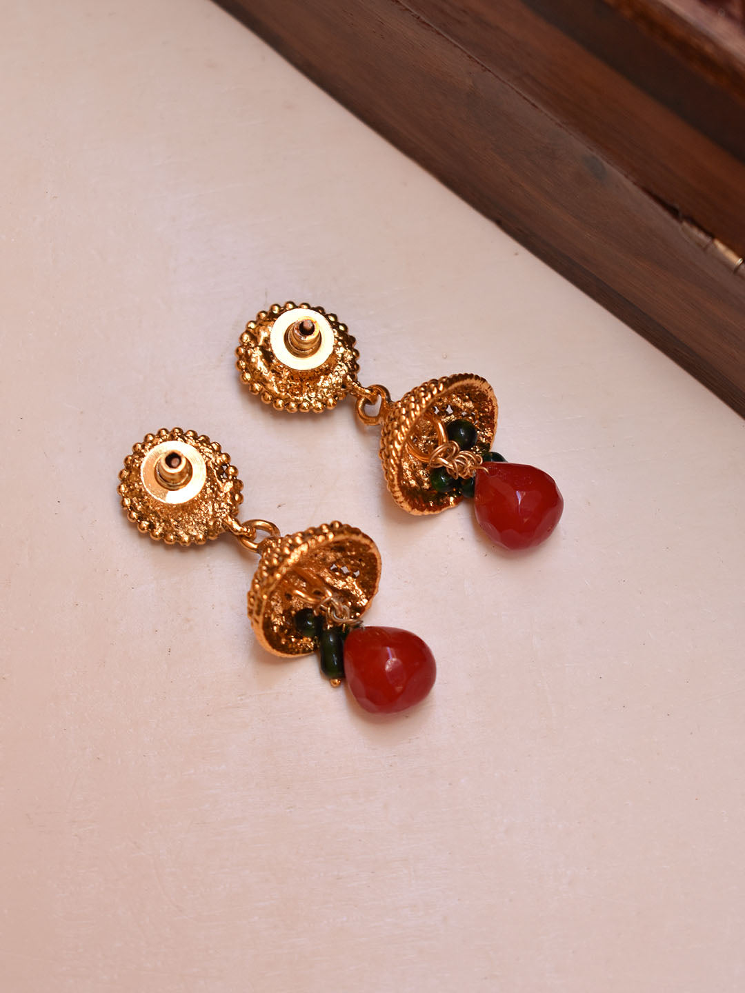 Avismaya Gold Plated Oval Design stud Maroon Color Stones With Hanging Beads Jhumka Earring