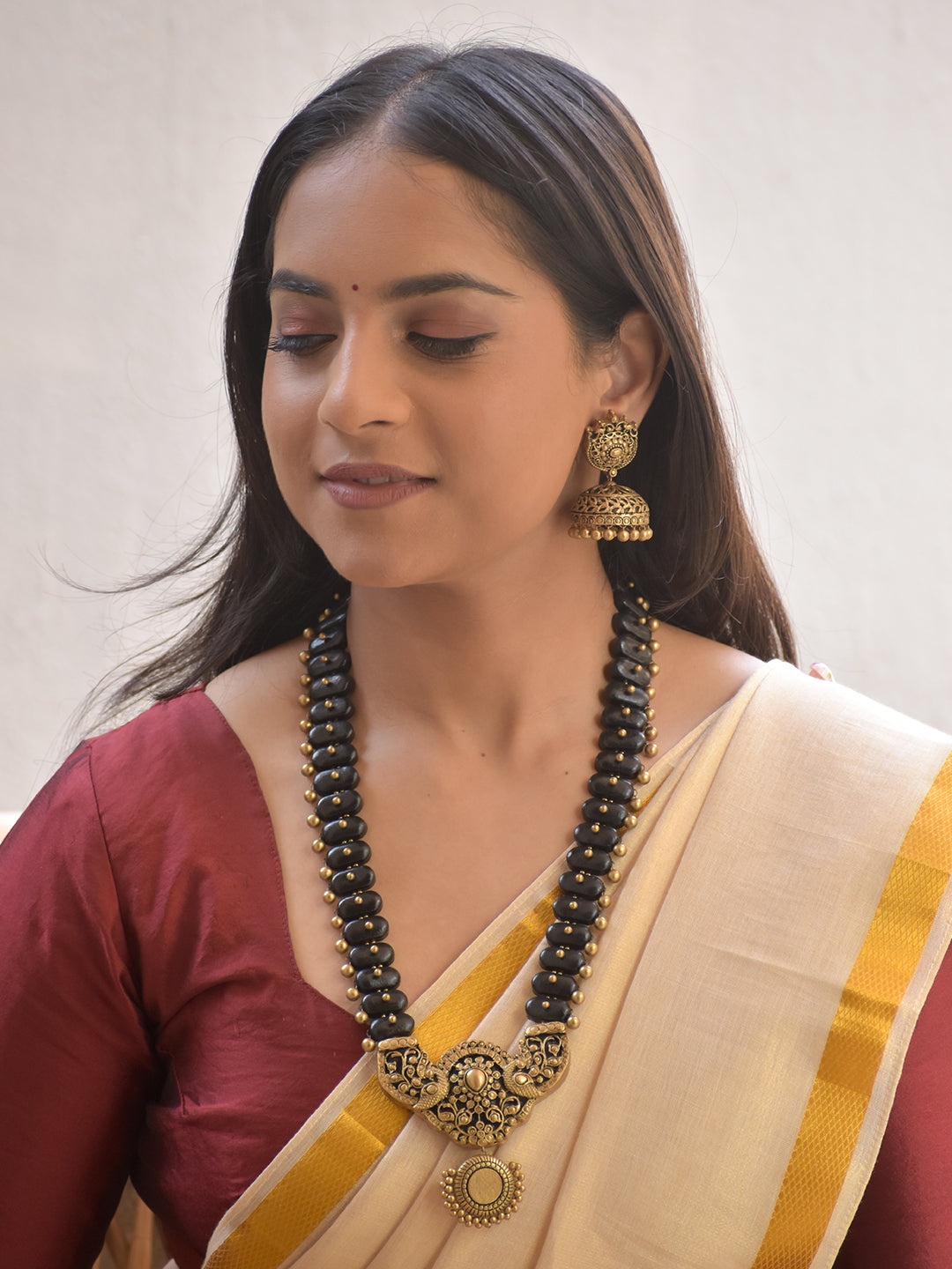 Shringarika – Handmade Terracotta Antique Black–Gold Necklace Set with Intricate Filigree Pendant and Jhumka Earrings