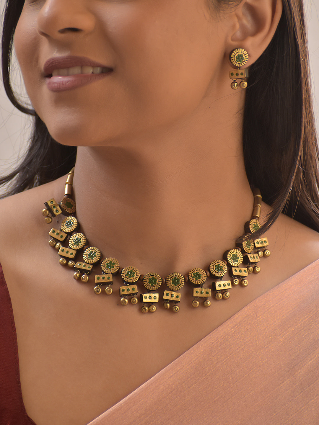 Varnika – Terracotta Floral Disc Necklace Set with Green Accents and Geometric Dangler Charms