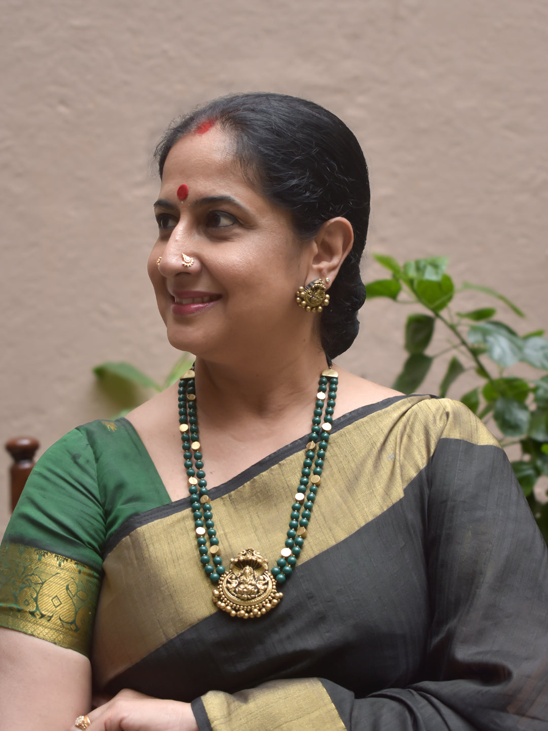 Vighneshvara - Handmade Terracotta Ganesha Pendant Necklace Set with Green Beads and Antique Gold Accents Earrings