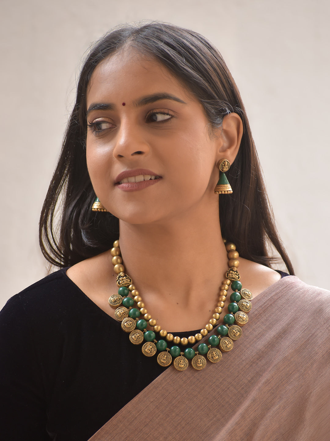 Shringarika – Handmade Terracotta Lakshmi Coin Necklace Set with Green Beads and Antique Temple Jhumka Earrings