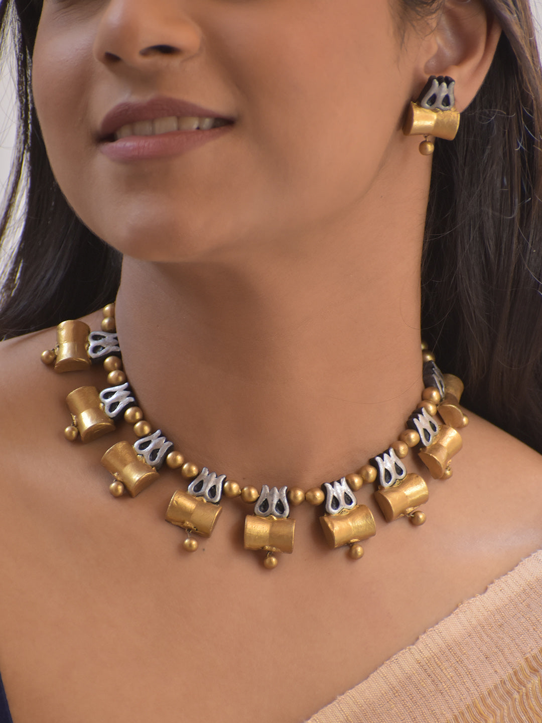 Handmade Terracotta Trishul Motif Gold Choker Necklace with Silver Accents and Stud Earrings