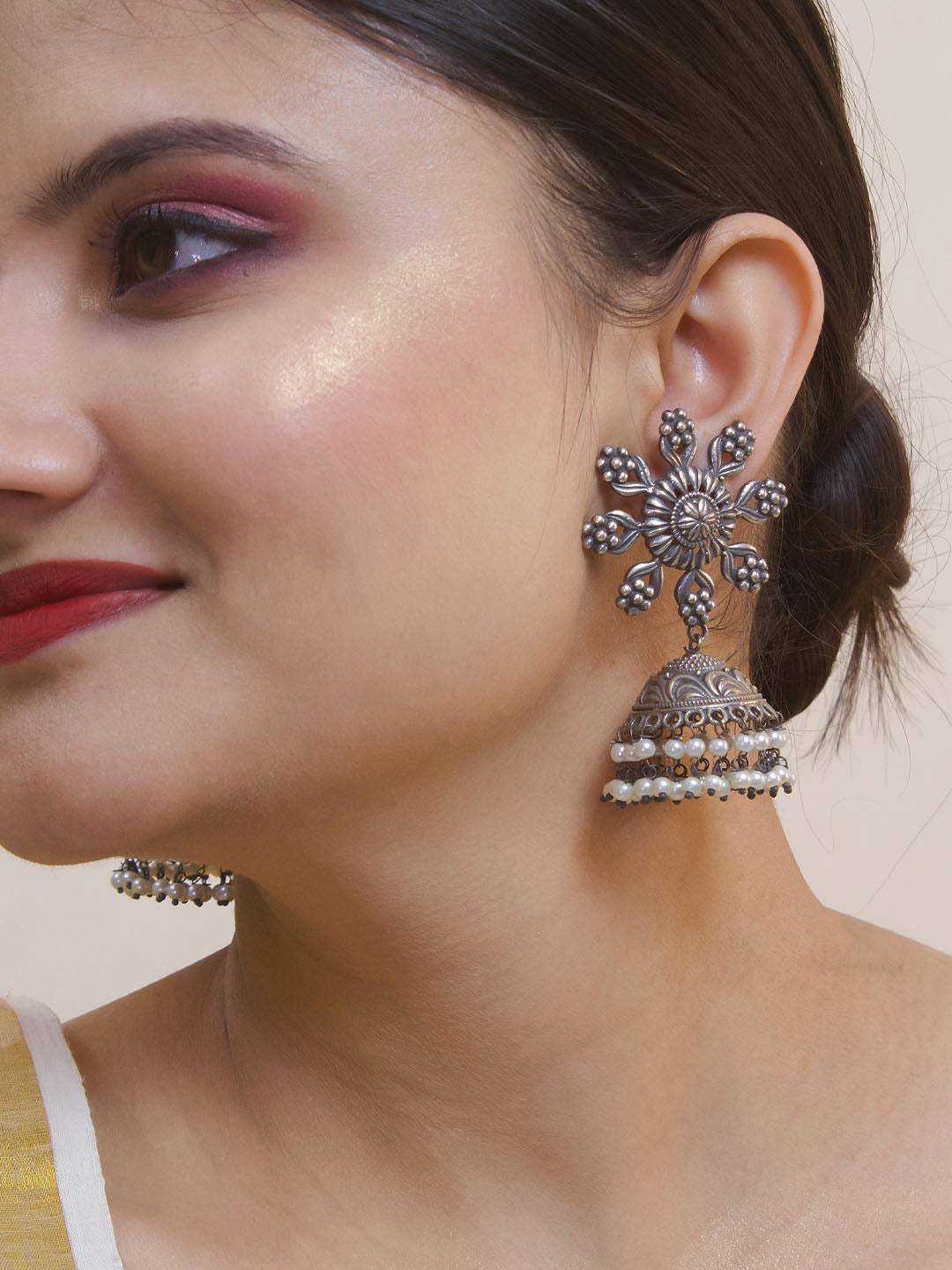 Silver Plated Floral Design Stud With Hanging White Pearls Jhumka Earring