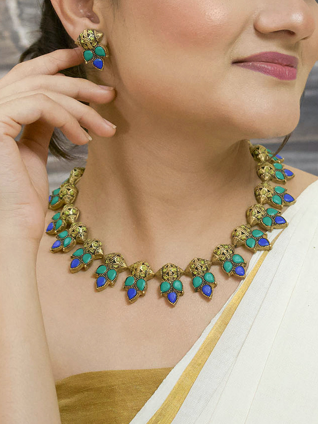 Pallavika — Antique Gold Toned Leaf Design Blue And Green Color Terracotta Choker Necklace Set