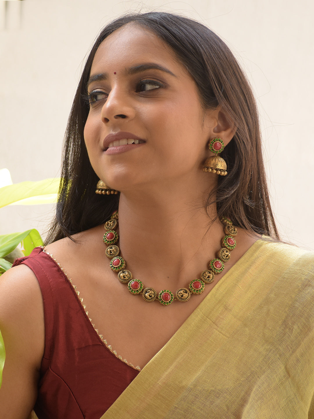 Mayurasundari - Handcrafted Antique Peacock Motif Terracotta Necklace Set with Red-Green Beaded Accents and Designer Earrings