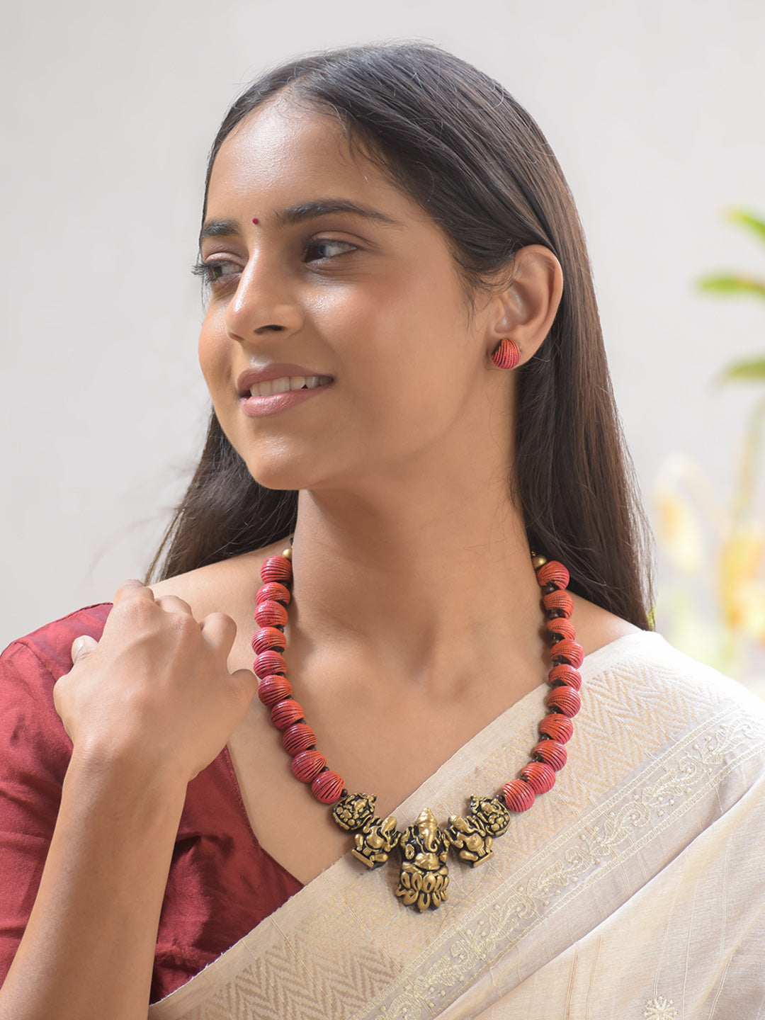 Aruna Ganapati — Ombre Shades of Orange Flower Petal Inspired Antique Gold Ganesha Engraved Pendant  Handmade Terracotta Necklace Set