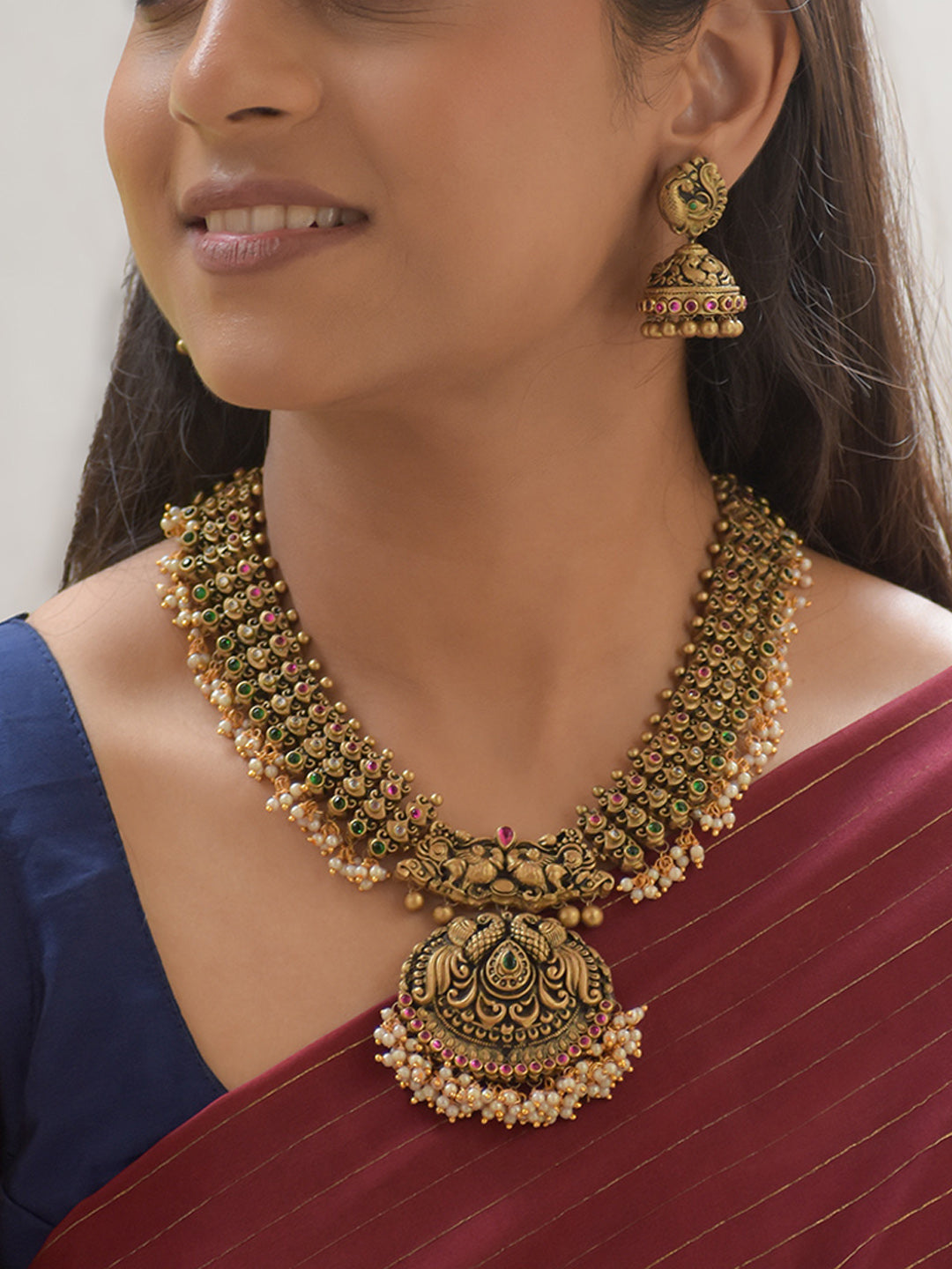 Mayuraja - Handcrafted Antique Peacock Motif Terracotta Necklace Set with Kemp Stones in Red Green and Pearl Fringe Design and Matching Earrings