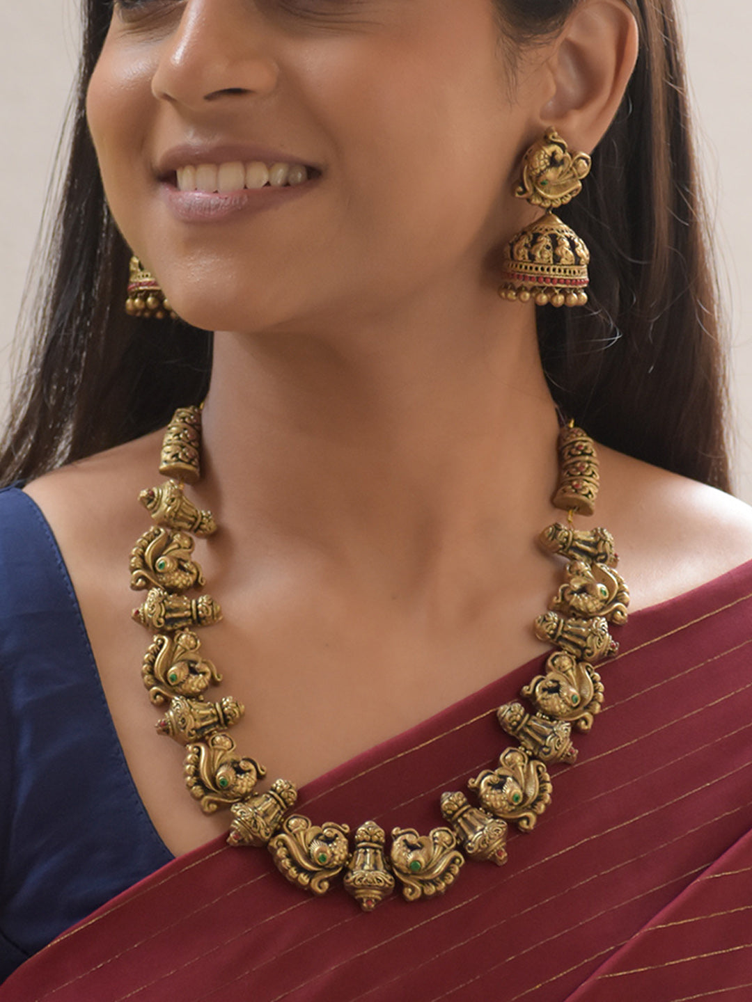 Varnika - Handcrafted Terracotta Motif Necklace Set with Antique Gold Finish and Matching Earrings