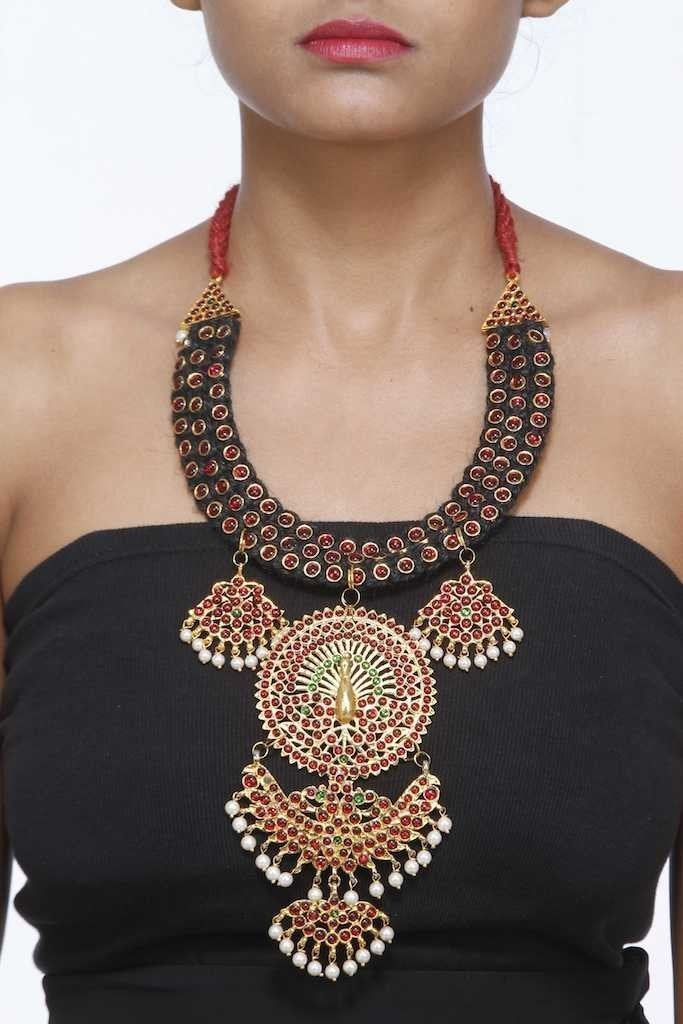 Charcoal Black Neckpiece With Red Stones And Peacock Motifs