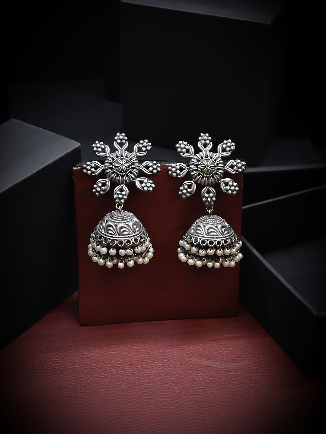 Silver Plated Floral Design Stud With Hanging White Pearls Jhumka Earring