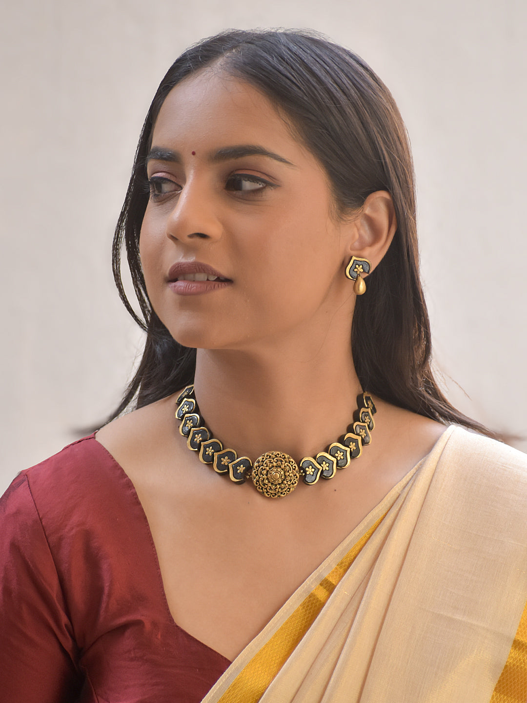 Hridaya – Handmade Terracotta Heart-Motif Choker Set with Antique Floral Centerpiece and Gold Drop Earrings