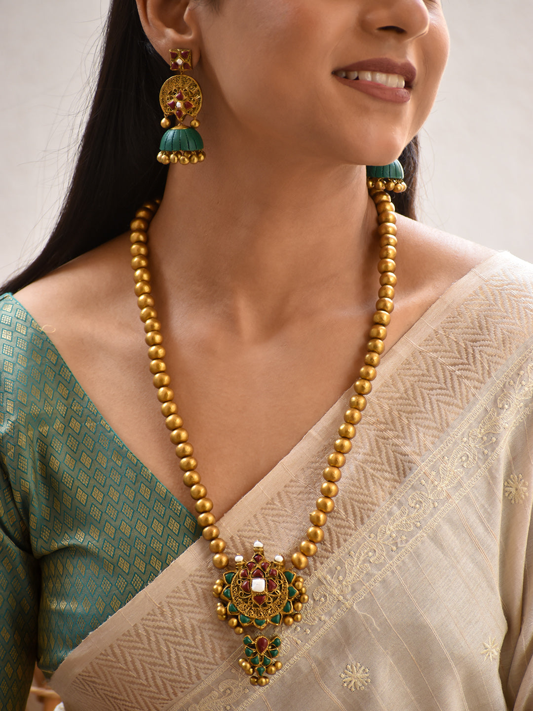 Terracotta Antique Gold Bead Necklace with Floral Statement Pendant & Green Jhumka Earrings