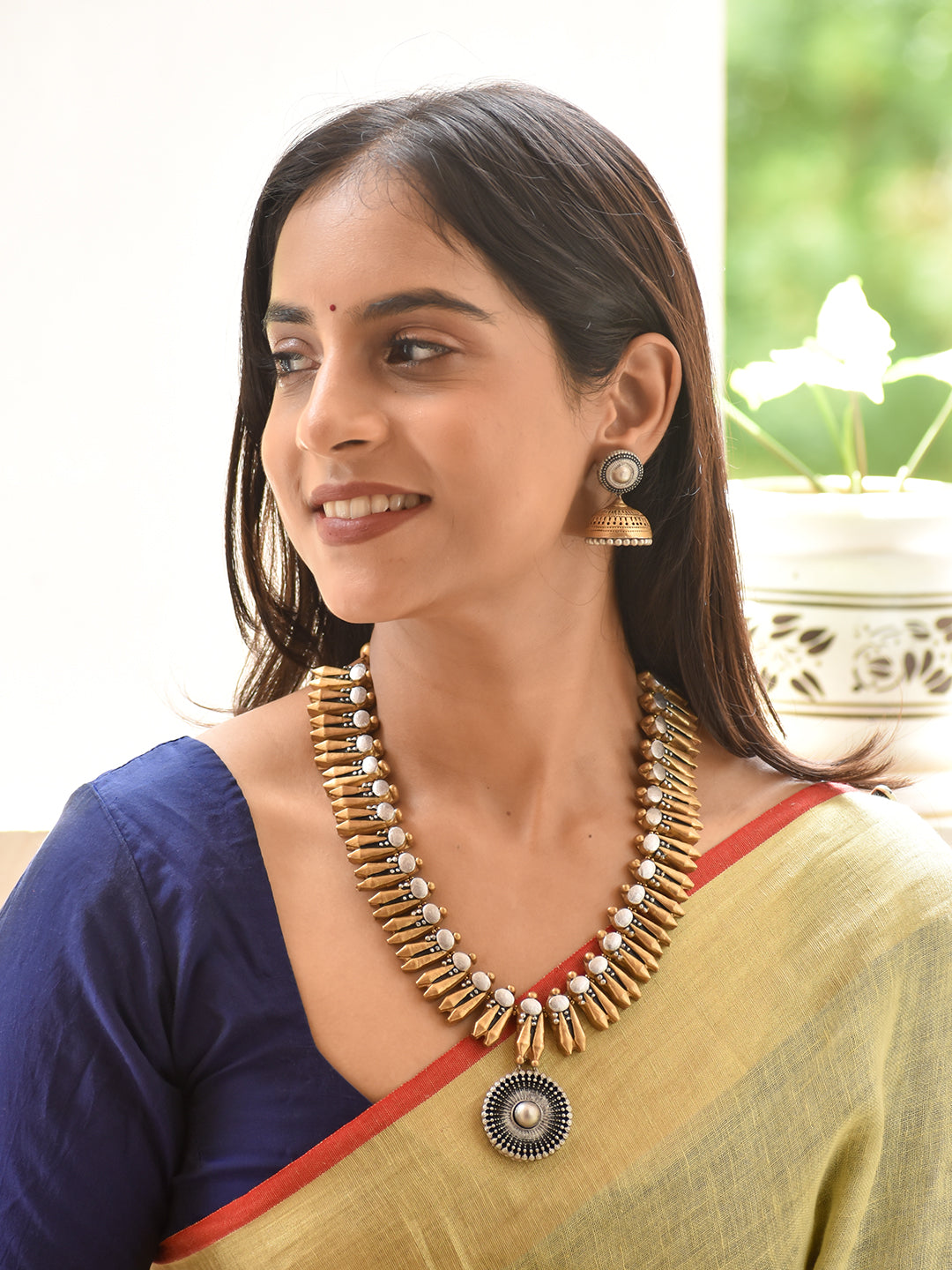 Aalaya - temple, abode Pearl Medallion Antique Statement Necklace Set