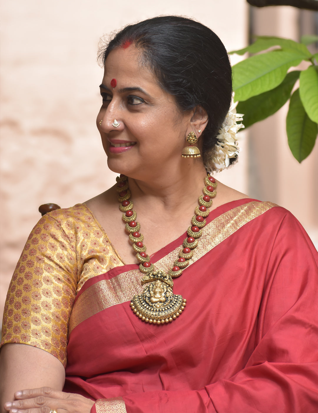 Chandrika - Handcrafted Terracotta Lakshmi Pendant Necklace Set with Red Crescent Beads and Antique Finish Earrings