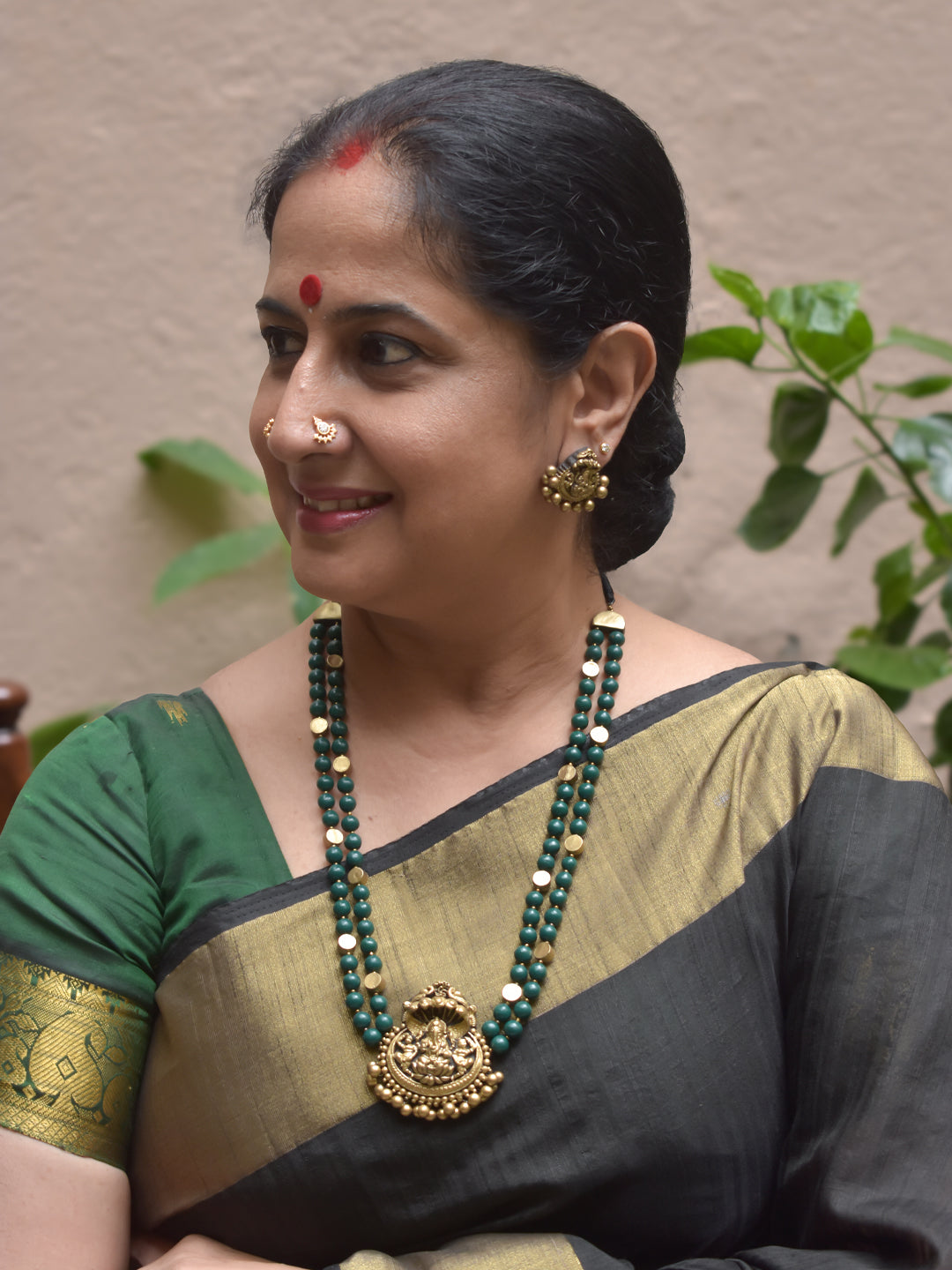 Vighneshvara - Handmade Terracotta Ganesha Pendant Necklace Set with Green Beads and Antique Gold Accents Earrings