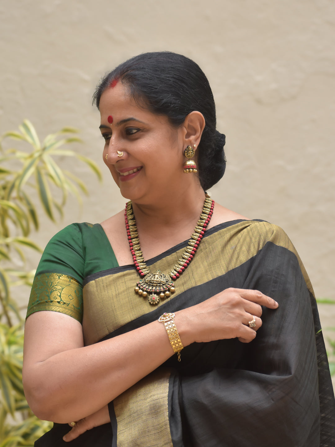 Varnika - Handmade Terracotta Lakshmi Pendant Necklace Set with Red Beads and Antique Gold Finish Earrings