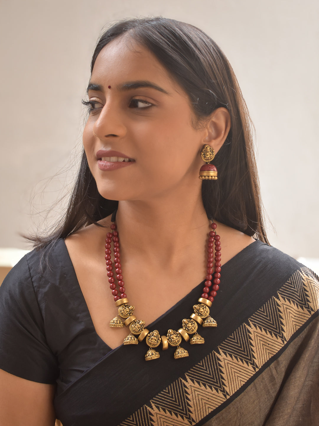 Mahika – Handmade Terracotta Lakshmi Necklace Set with Ruby Beads and Antique Gold Jhumka Earrings