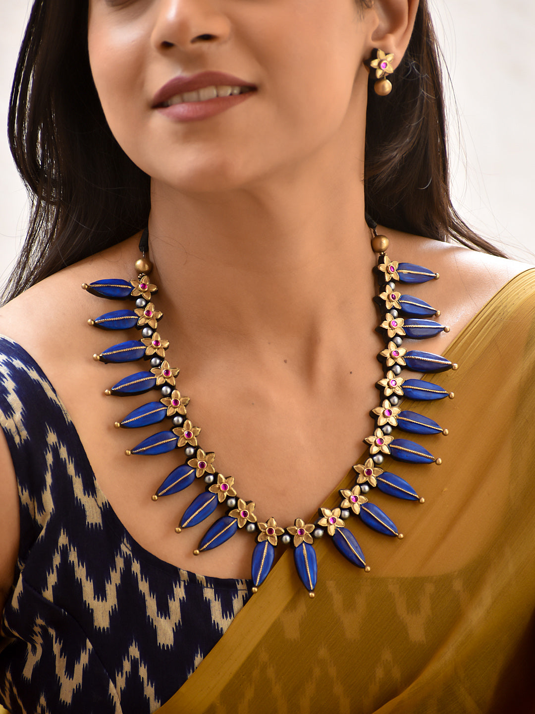 Kuvalai — Blue Petal Floral Necklace