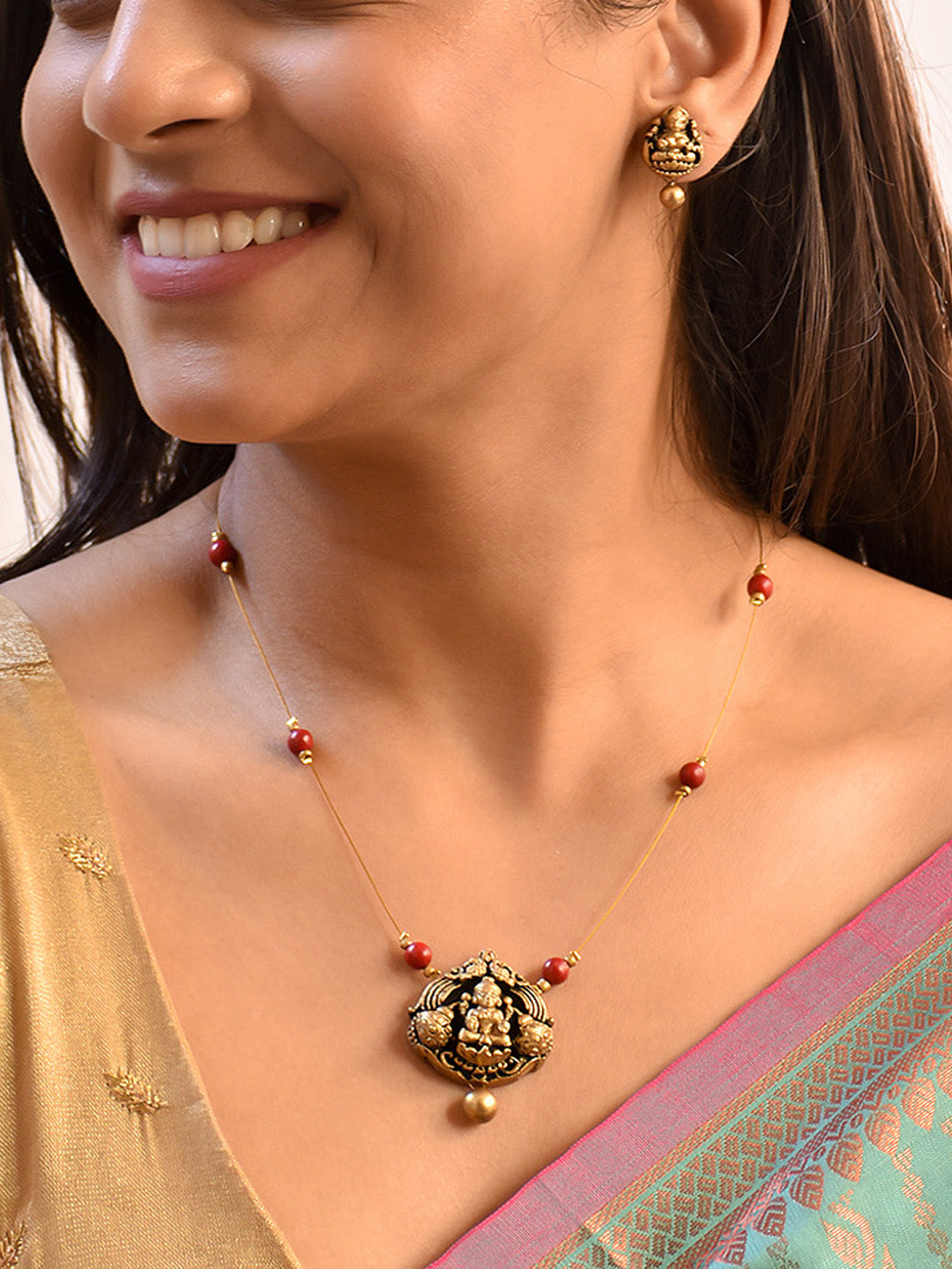Shreevarshini — Celebrity style Handcrafted Lakshmi Design Gold Red Jewelry Set