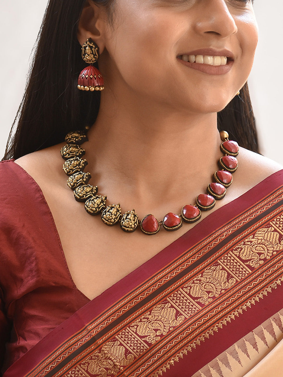 Raktambara Vinayaka —  Handcrafted Divine Ganesha Pendants Terracotta Jewellery Set in Red and Antique Gold