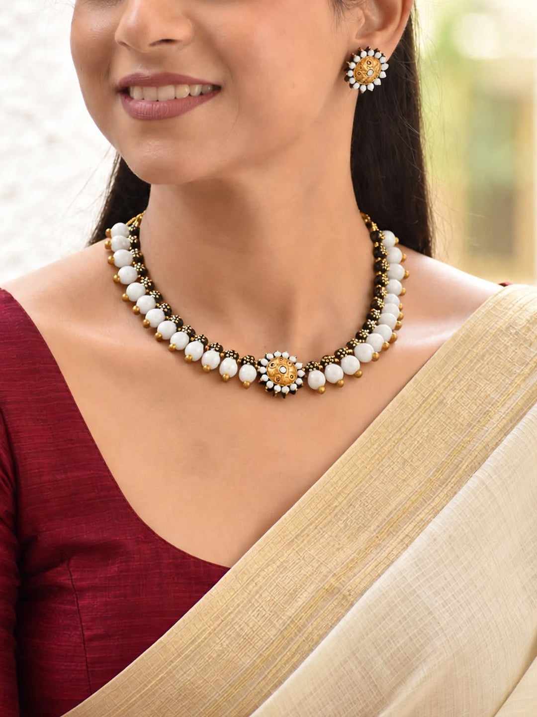 Mukta – Handmade White & Antique Gold Floral Necklace Set