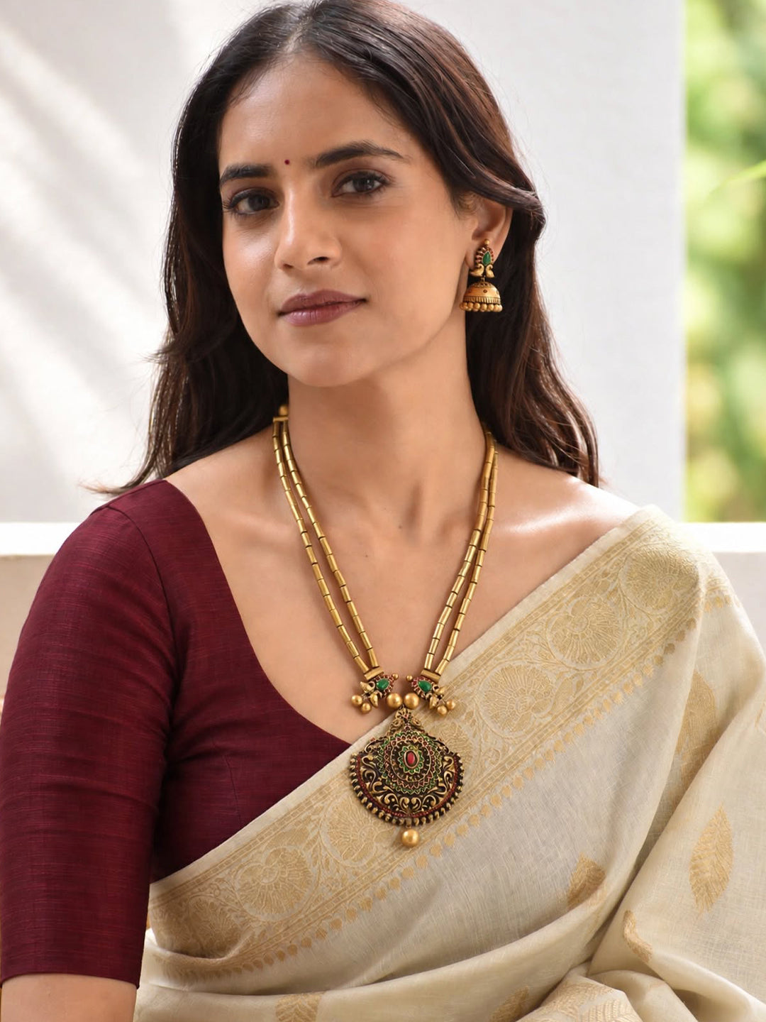 Dvimayura — Antique Gold Toned Peacock Design Pendant Two Layered Cylindrical Shape Beads Terracotta Necklace Set