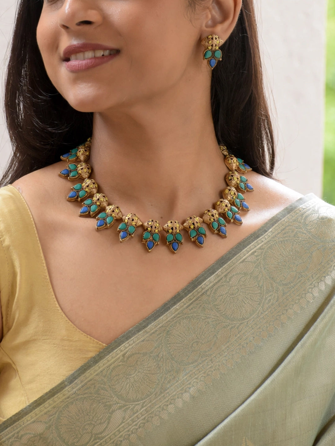 Pallavika — Antique Gold Toned Leaf Design Blue And Green Color Terracotta Choker Necklace Set