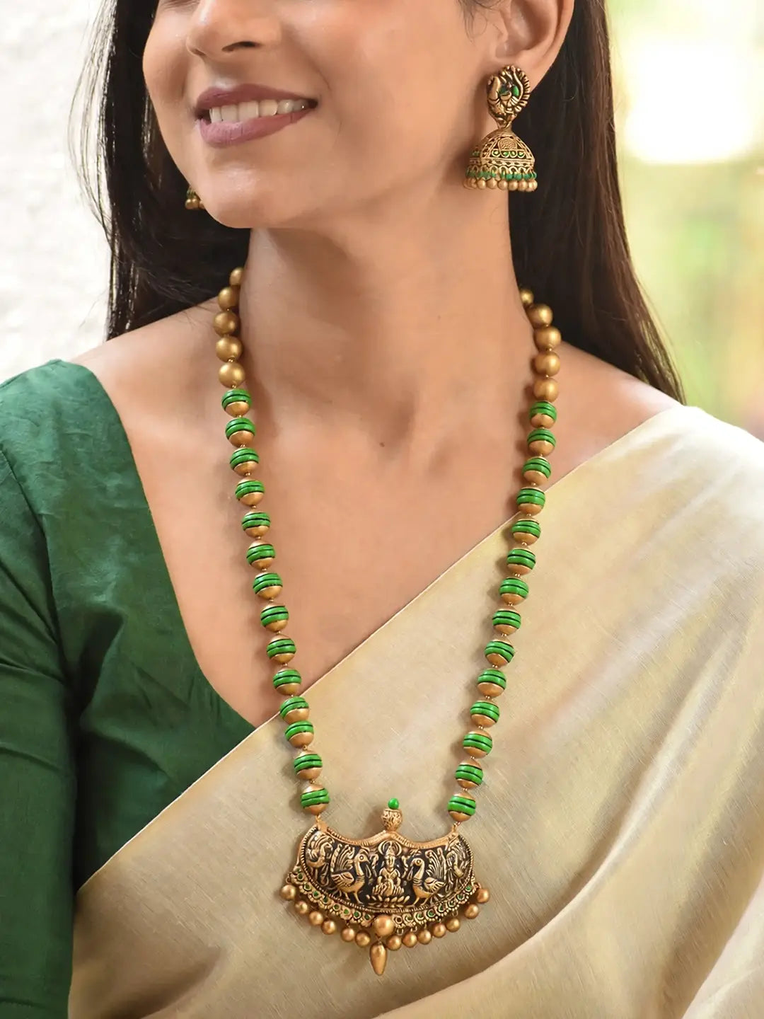 Antique Gold Toned lakshmi Design Pendant With Green Color Beads Terracotta Medium Necklace Set
