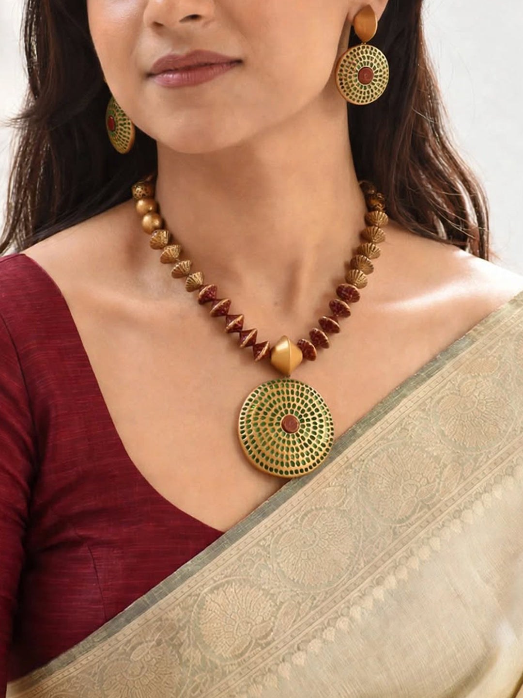 Antique Gold Toned Circular Shape Pendant Brown And Green Color Terracotta Choker Necklace Set