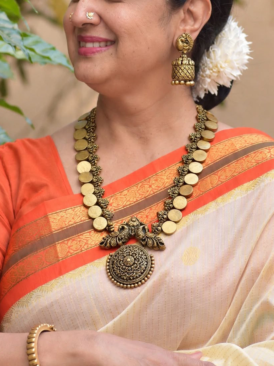 Svarnamayura — Antique Gold Coin Floral Peacock Design Circular Pendant Haram Style Handmade Terracotta Necklace Set