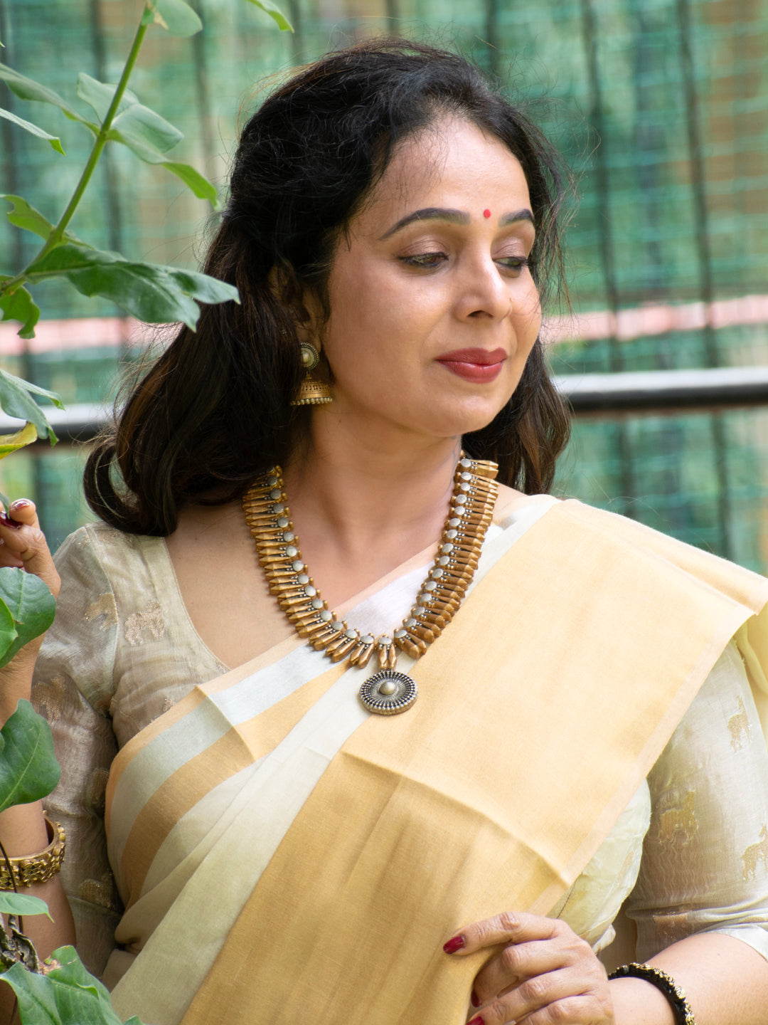 Aalaya - temple, abode Pearl Medallion Antique Statement Necklace Set