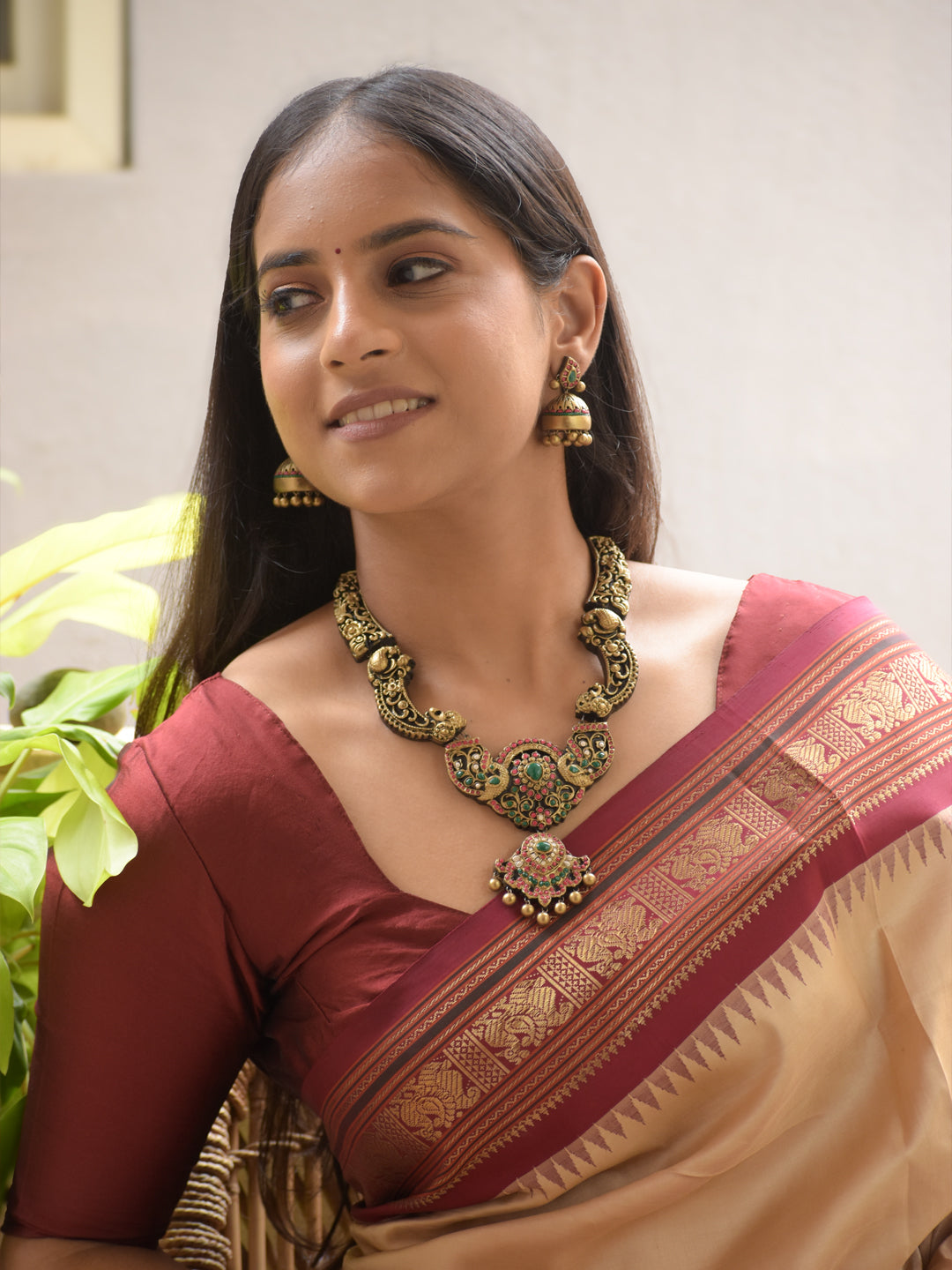 Mayurangana - Handmade Terracotta Peacock Necklace Set with Red-Green Stones and Antique Floral Engraving Earrings