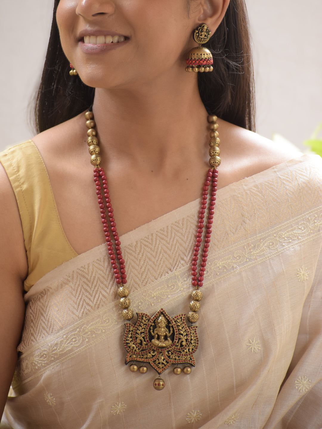 Padmalaya - Handmade Terracotta Lakshmi Pendant Necklace Set with Red Beads and Antique Lotus Frame and Matching Earrings