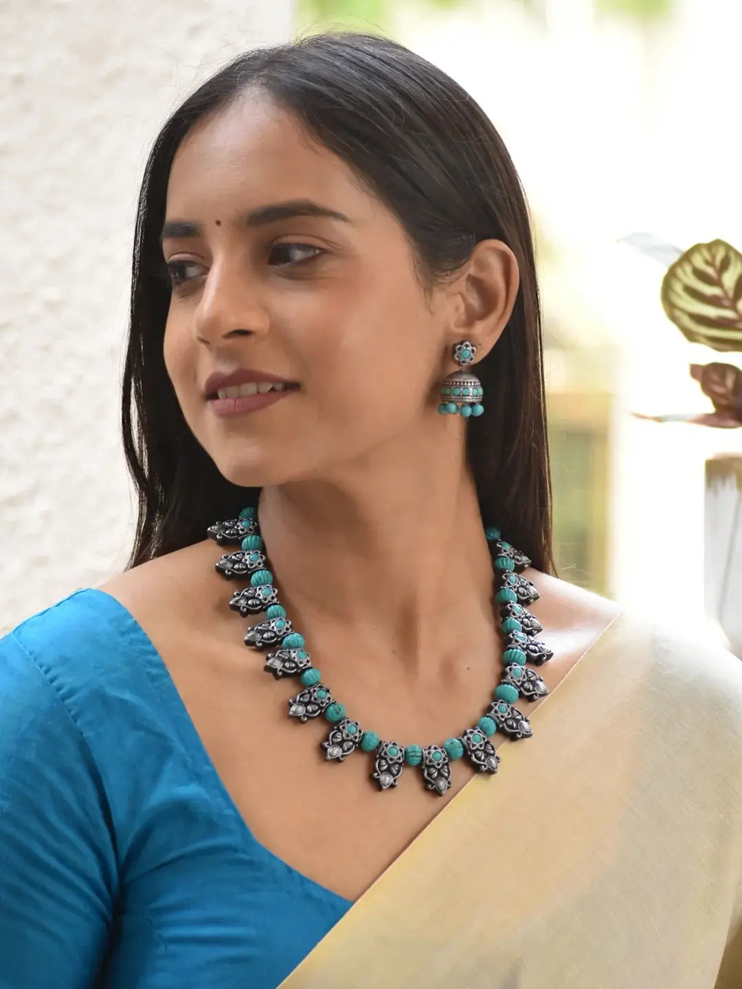 Shivaranjani - Handmade Terracotta Oxidized Silver Peacock Necklace Set with Blue Accents and Matching Earrings