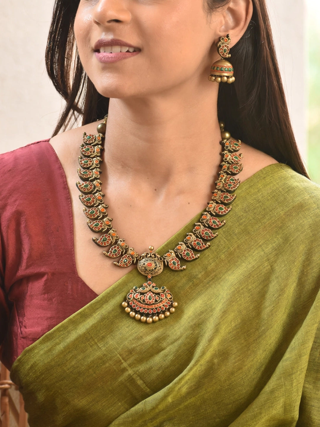 Mayuramra — Antique Gold Toned Peacock Design Pendant Red And Green Color With Mango Design Motifs Choker Handmade Terracotta Necklace Set