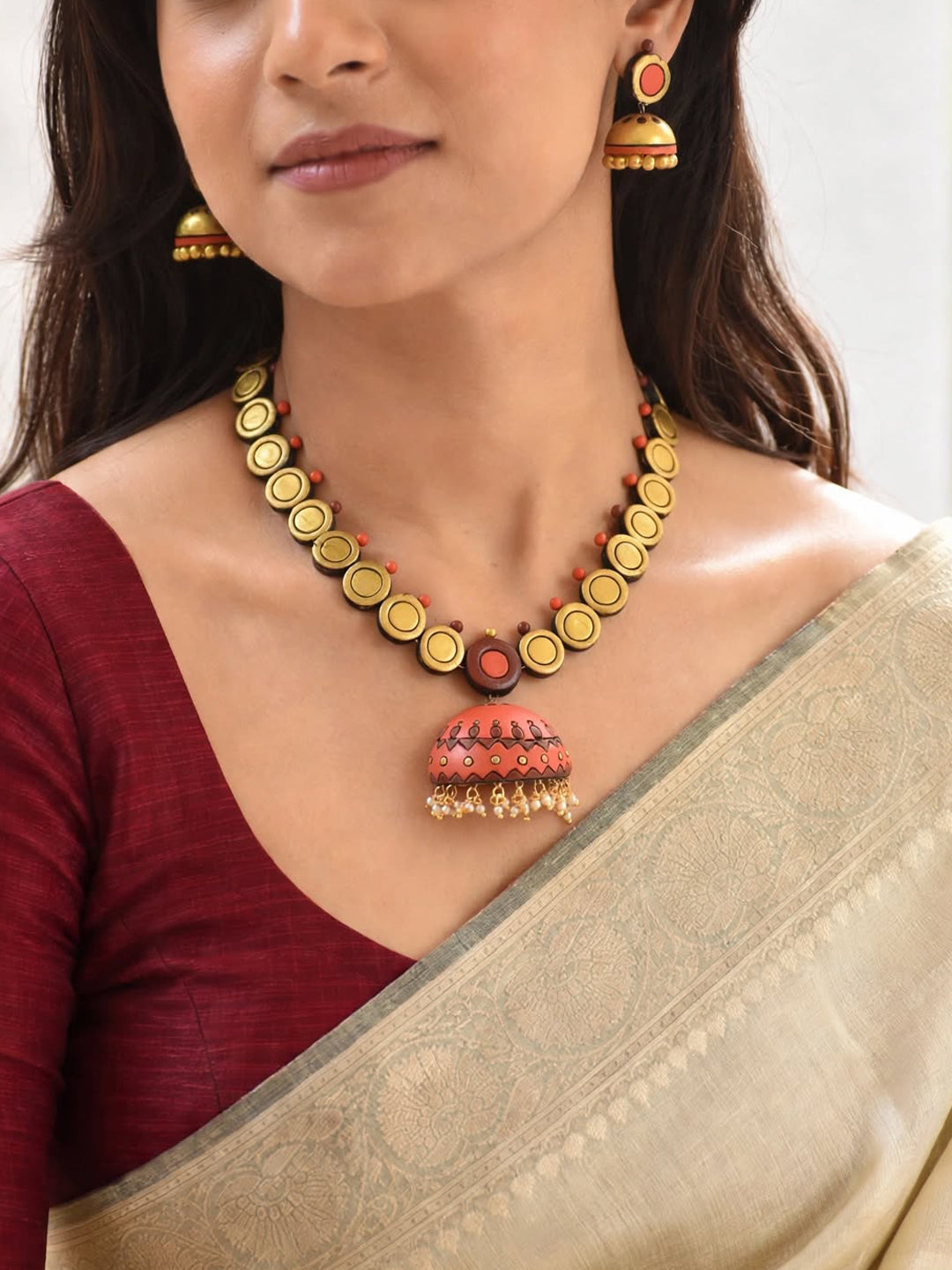 Kashvi – Handmade Coral Orange Jhumka Pendant Necklace Set