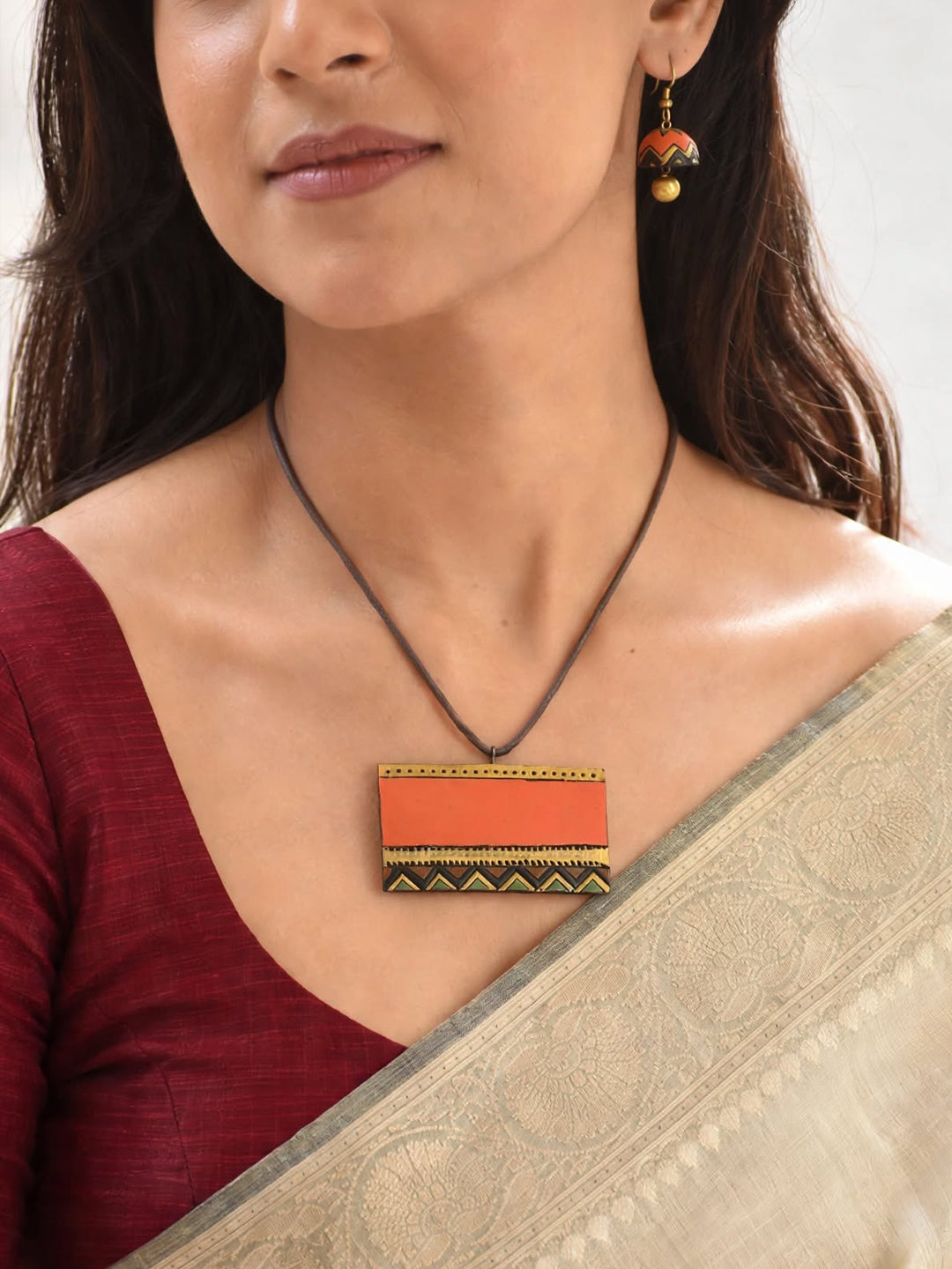 Arunika – Handmade Coral Orange Geometric Pendant Necklace Set