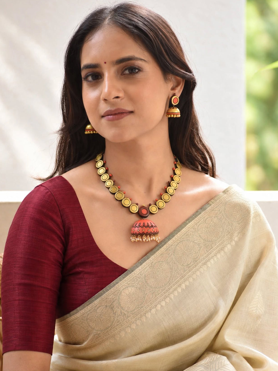 Kashvi – Handmade Coral Orange Jhumka Pendant Necklace Set