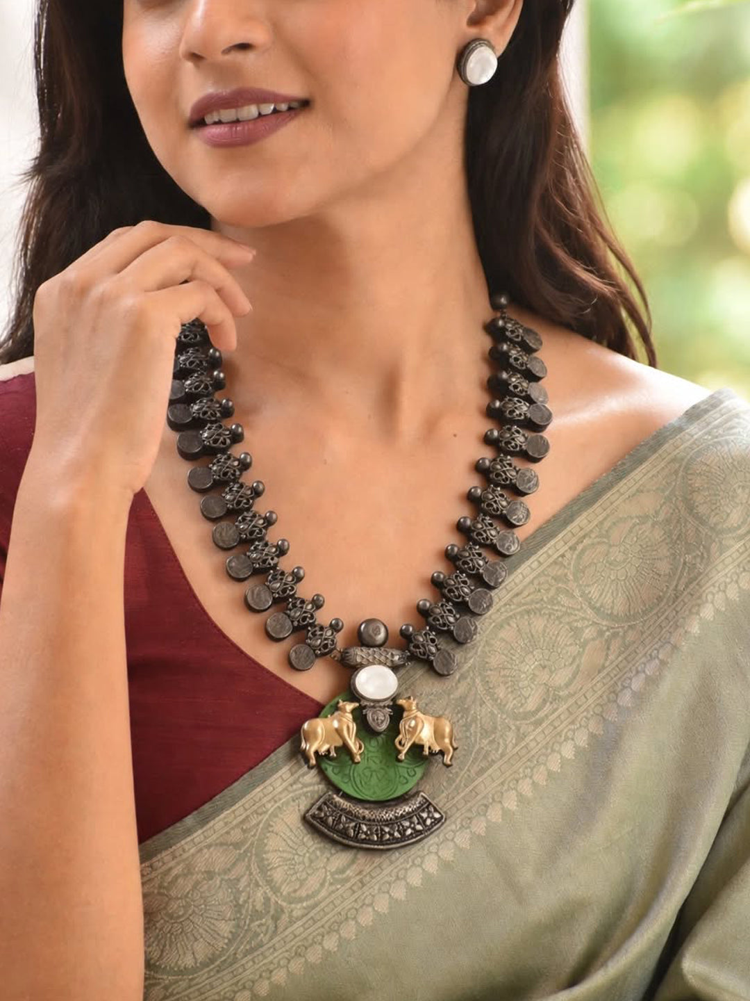 Shyamali – Handmade Green, Pearl & Oxidised Black Twin Cow Necklace Set