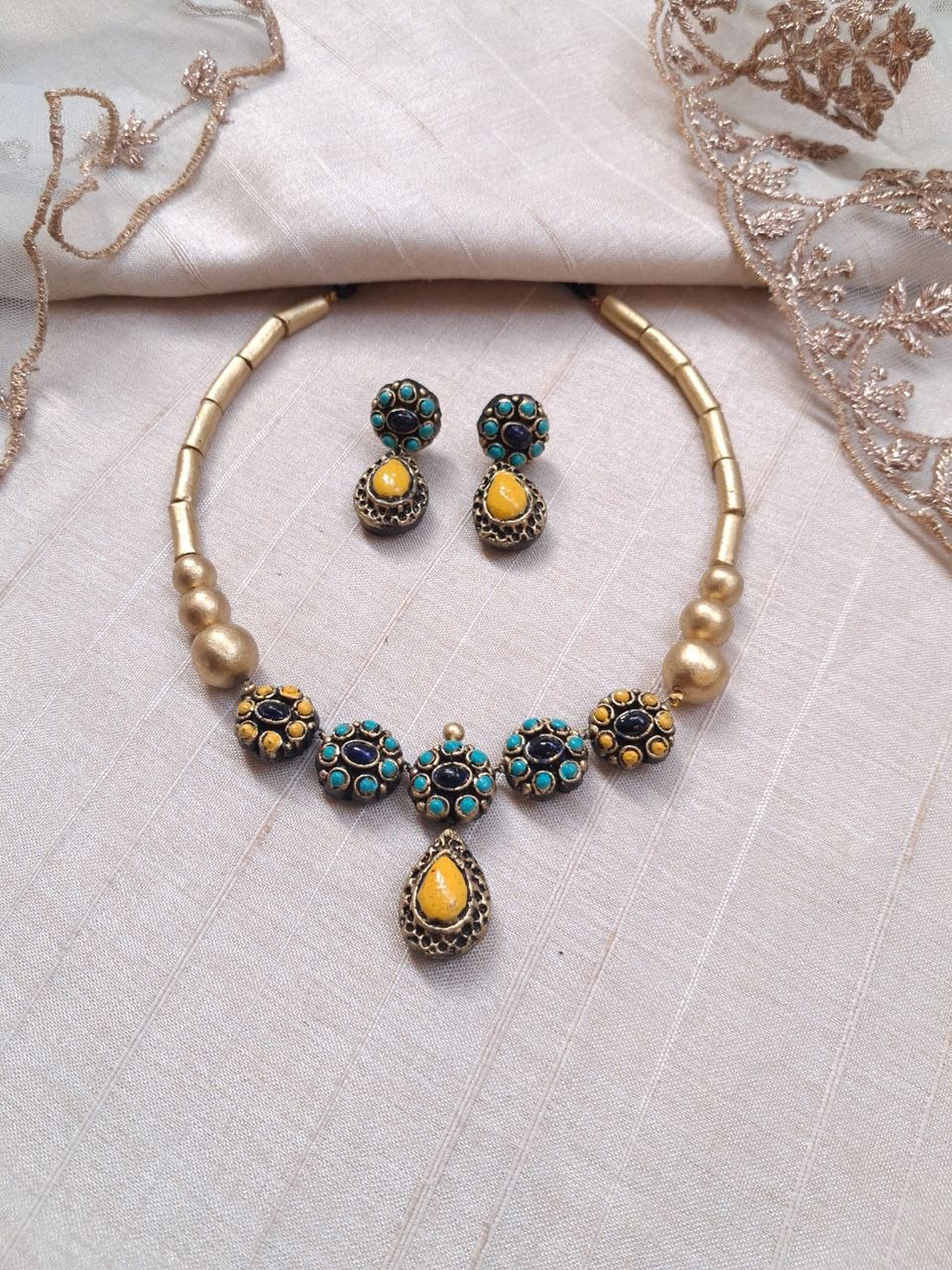 Terracotta Circular Stone Necklace with Teardrop Pendant
